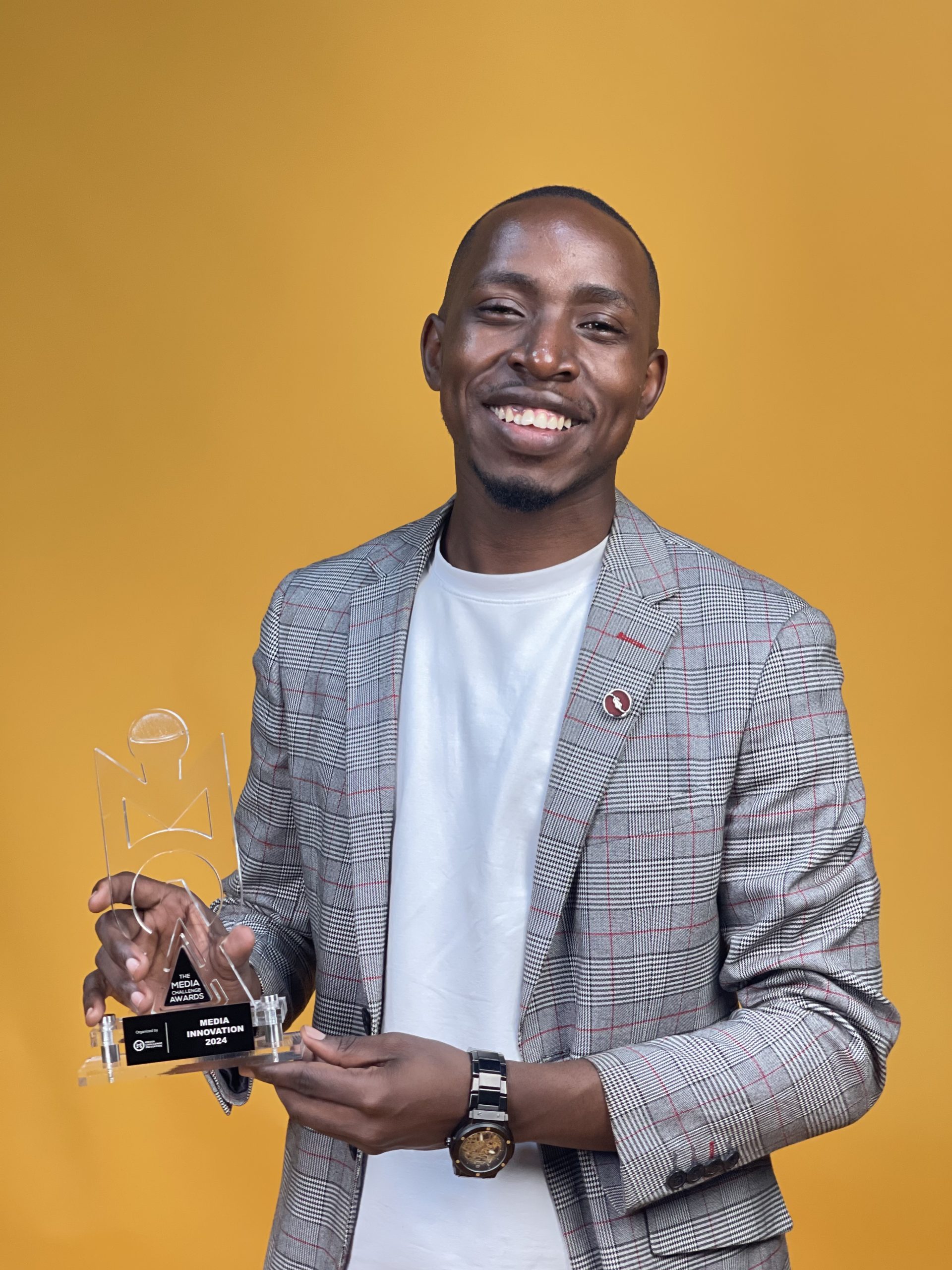 Phillip receiving Media Innovation Award